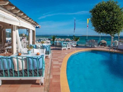 Outdoor pool at Oasis Beach Hotel Spa