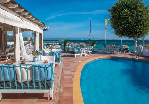 Outdoor pool at Oasis Beach Hotel Spa