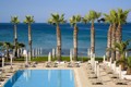 Swimming pool with sea views at Vrissiana Beach Hotel