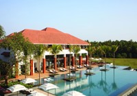 Alila Diwa pool with bar and restaurant.jpg