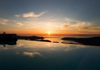 Avaton Resort And Spa Infinity Pool At Sunset