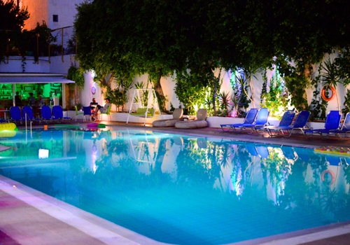 Night View of Pool at Porto Plazza Hotel