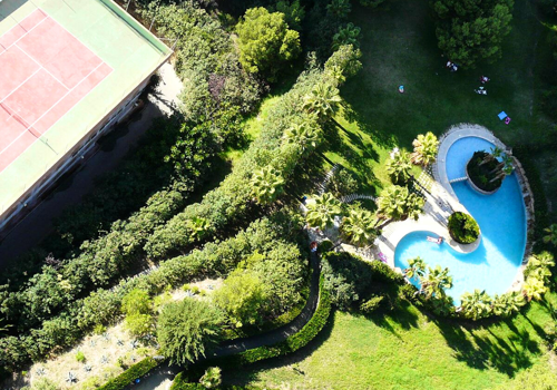 Aerial View of Benibeach Apartments Pool and Tennis Court