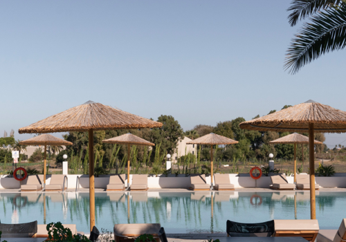 Poolside at Grecotel Casa Paradiso