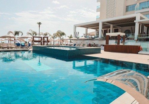 Swimming pool at Cavo Maris Beach Hotel