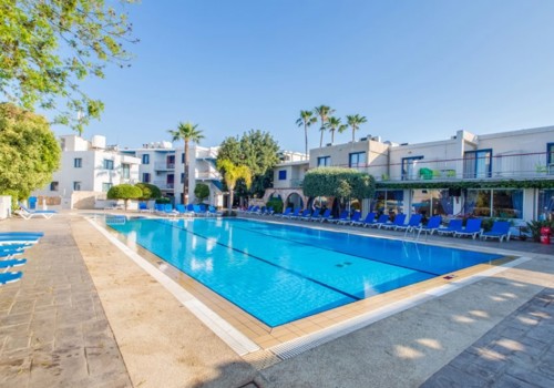 Outdoor Pool At Green Bungalows Hotel Apartments
