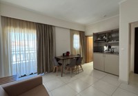 Living And Kitchen Space In One Bedroom Apartment At Ioli Village